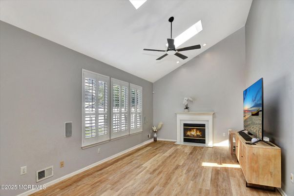 Empty room, Fireplace, Interior, Recessed Lighting, Wood Texture Flooring