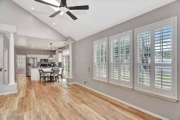 Dining room, Interior, Kitchen, Pendant Lights, Recessed Lighting, Stainless Steel Appliances, Wood Texture Flooring