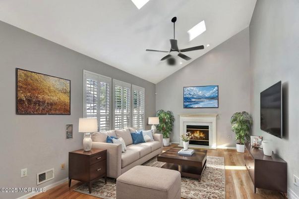 Fireplace, Interior, Living room, Recessed Lighting, Wood Texture Flooring