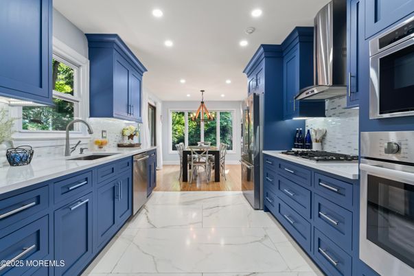 Dining room, Interior, Kitchen, Marble, Pendant Lights, Recessed Lighting, Stainless Steel Appliances, Wood Texture Flooring