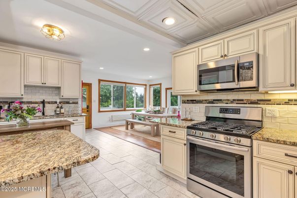 Dining room, Interior, Kitchen, Recessed Lighting, Stainless Steel Appliances, Wood Texture Flooring
