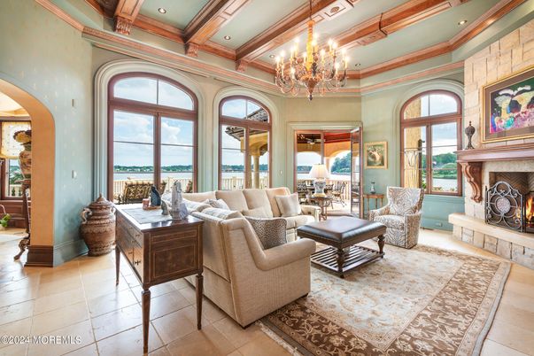 Chandelier, Fireplace, Interior, Living room, Recessed Lighting, Water, Wooden Beams