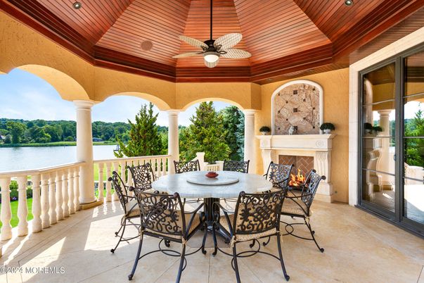 Exterior, Fireplace, Water, Wooden Ceilings