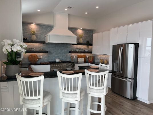 Interior, Kitchen, Recessed Lighting, Stainless Steel Appliances, Stone Walls, Wood Texture Flooring
