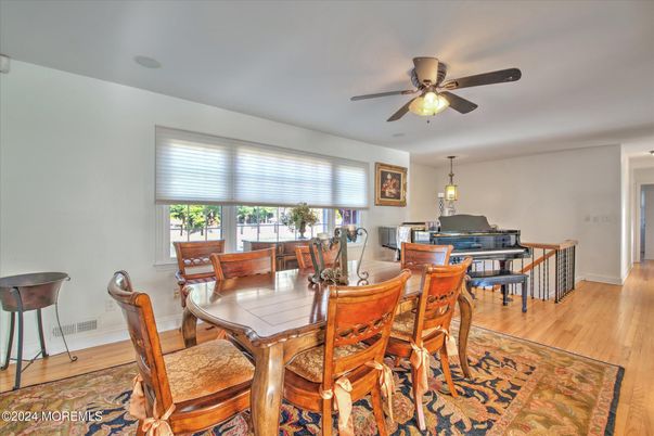 Dining room, Interior, Pendant Lights, Piano, Wood Texture Flooring