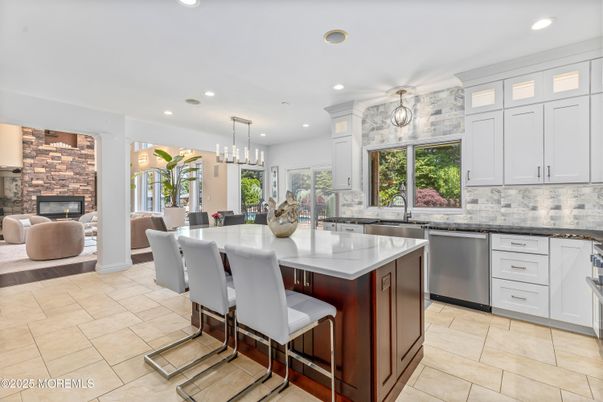 Dining room, Fireplace, Interior, Kitchen, Living room, Pendant Lights, Recessed Lighting, Stainless Steel Appliances, Stone Walls