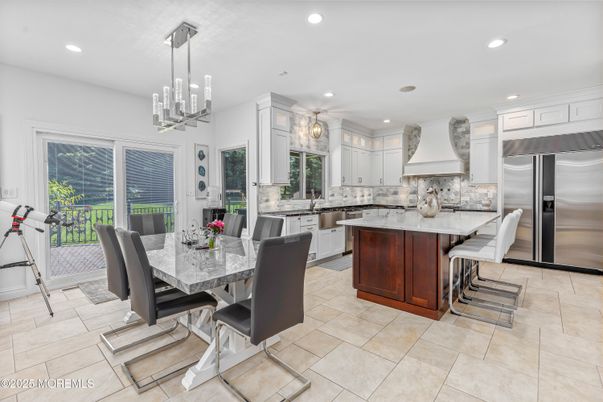 Chandelier, Dining room, Interior, Kitchen, Pendant Lights, Recessed Lighting, Stainless Steel Appliances