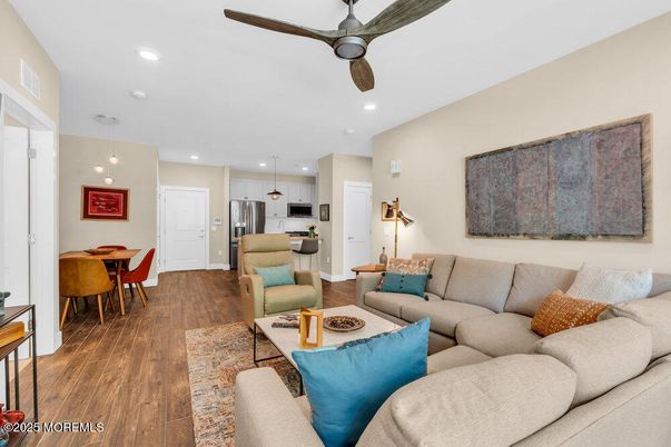 Dining room, Interior, Kitchen, Living room, Pendant Lights, Recessed Lighting, Stainless Steel Appliances, Wood Texture Flooring