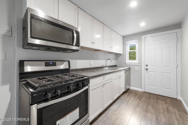 Interior, Kitchen, Recessed Lighting, Stainless Steel Appliances, Wood Texture Flooring