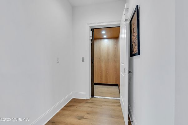 Elevator, Interior, Recessed Lighting, Wooden Ceilings, Wood Texture Flooring, Wooden Walls