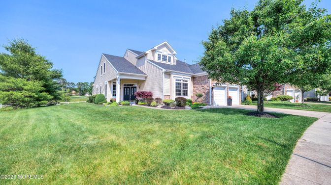 Attached, Backyard, Exterior, Facade, Brick Facade, Cape Cod