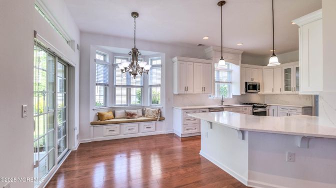 Chandelier, Interior, Kitchen, Pendant Lights, Recessed Lighting, Stainless Steel Appliances, Wood Texture Flooring