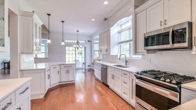 Interior, Kitchen, Pendant Lights, Recessed Lighting, Stainless Steel Appliances, Wood Texture Flooring