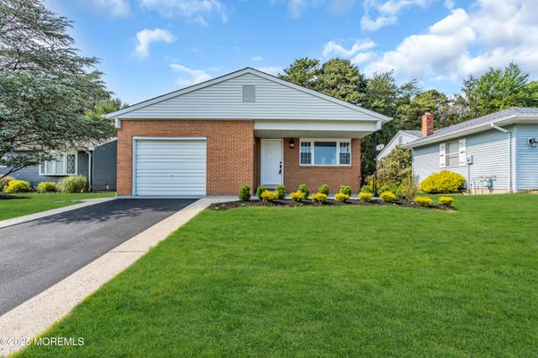 Attached, Exterior, Facade, Brick Facade, Split Level