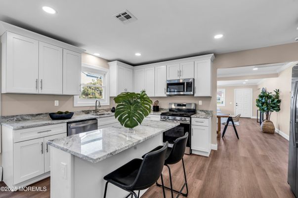 Interior, Kitchen, Recessed Lighting, Stainless Steel Appliances, Wood Texture Flooring