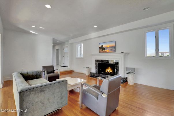 Fireplace, Interior, Living room, Recessed Lighting, Wood Texture Flooring