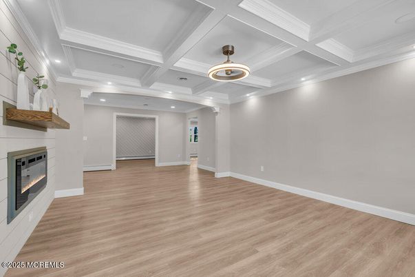 Empty room, Fireplace, Interior, Pendant Lights, Recessed Lighting, Wood Texture Flooring