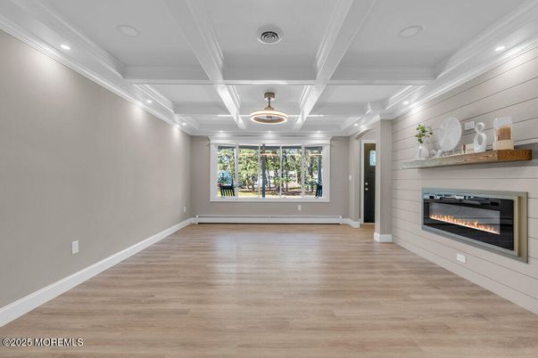 Empty room, Fireplace, Interior, Recessed Lighting, Wood Texture Flooring