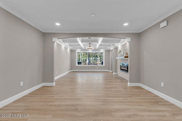 Empty room, Fireplace, Interior, Recessed Lighting, Wood Texture Flooring