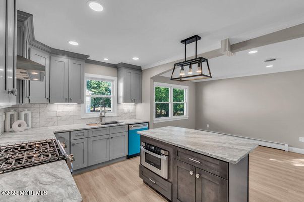 Interior, Kitchen, Pendant Lights, Recessed Lighting, Stainless Steel Appliances, Wood Texture Flooring