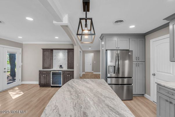 Interior, Kitchen, Pendant Lights, Recessed Lighting, Stainless Steel Appliances, Wood Texture Flooring