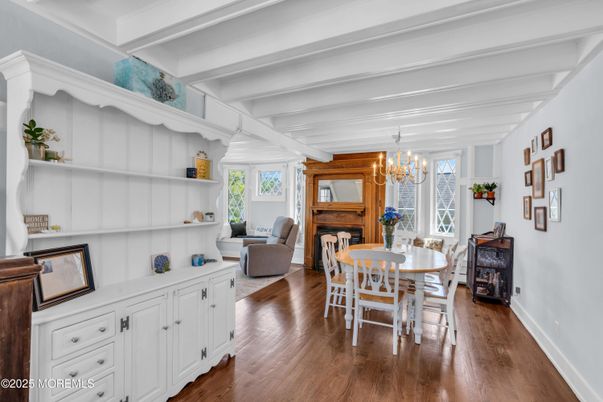 Chandelier, Dining room, Fireplace, Interior, Piano, Wood Texture Flooring