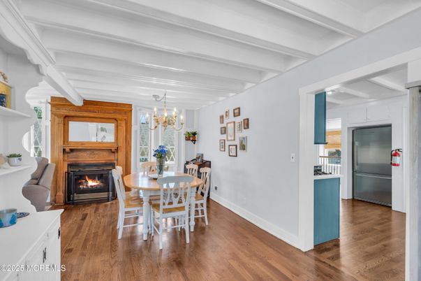 Chandelier, Dining room, Fireplace, Interior, Wood Texture Flooring