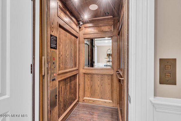 Elevator, Interior, Recessed Lighting, Wooden Ceilings, Wood Texture Flooring, Wooden Walls