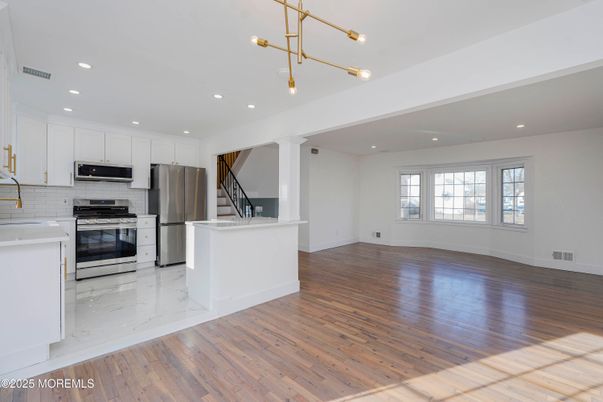 Interior, Kitchen, Marble, Pendant Lights, Recessed Lighting, Stainless Steel Appliances, Wood Texture Flooring