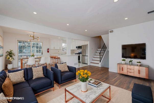 Dining room, Interior, Kitchen, Living room, Pendant Lights, Recessed Lighting, Stainless Steel Appliances, Wood Texture Flooring