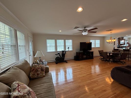 Chandelier, Dining room, Fitness Equipment, Interior, Living room, Recessed Lighting, Wood Texture Flooring