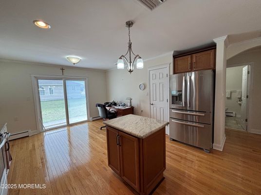 Dining room, Interior, Kitchen, Pendant Lights, Recessed Lighting, Stainless Steel Appliances, Wood Texture Flooring