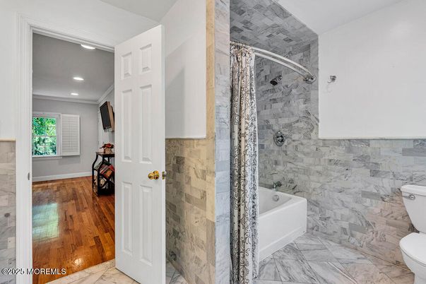 Bathroom, Glass Shower, Interior, Marble, Marble Walls, Recessed Lighting, Wood Texture Flooring
