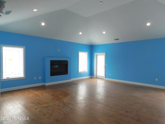 Empty room, Fireplace, Interior, Recessed Lighting, Wood Texture Flooring