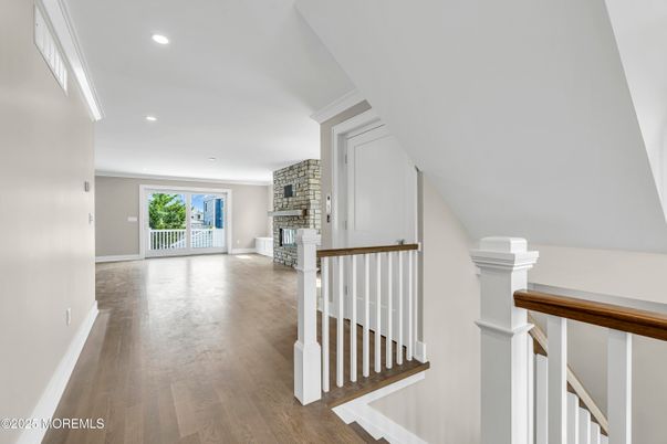 Fireplace, Interior, Recessed Lighting, Stone Walls, Wood Texture Flooring