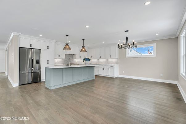 Chandelier, Interior, Kitchen, Pendant Lights, Recessed Lighting, Stainless Steel Appliances, Wood Texture Flooring