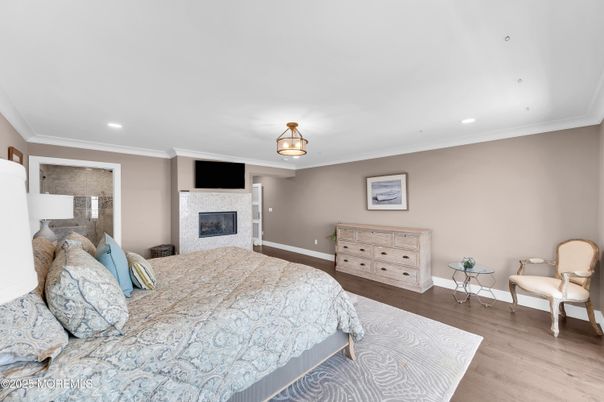 Bedroom, Fireplace, Interior, Recessed Lighting, Wood Texture Flooring