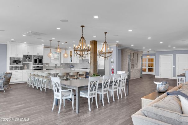 Dining room, Interior, Kitchen, Pendant Lights, Recessed Lighting, Stainless Steel Appliances, Wood Texture Flooring