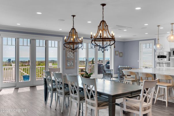 Chandelier, Dining room, Interior, Kitchen, Pendant Lights, Recessed Lighting, Water, Wood Texture Flooring