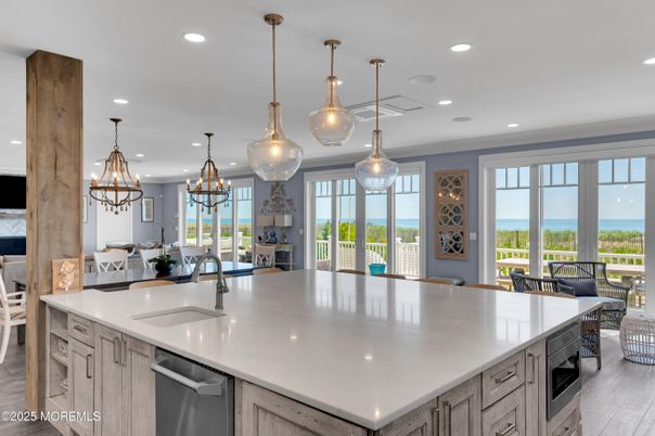 Chandelier, Interior, Kitchen, Pendant Lights, Recessed Lighting, Stainless Steel Appliances, Water, Wood Texture Flooring
