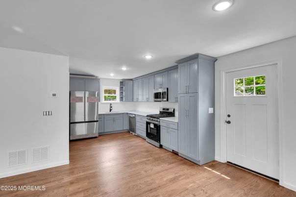 Interior, Kitchen, Recessed Lighting, Stainless Steel Appliances, Wood Texture Flooring