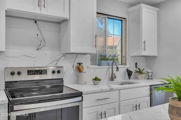 Interior, Kitchen, Marble Walls, Stainless Steel Appliances