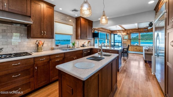 Chandelier, Interior, Kitchen, Pendant Lights, Recessed Lighting, Stainless Steel Appliances, Water, Wood Texture Flooring