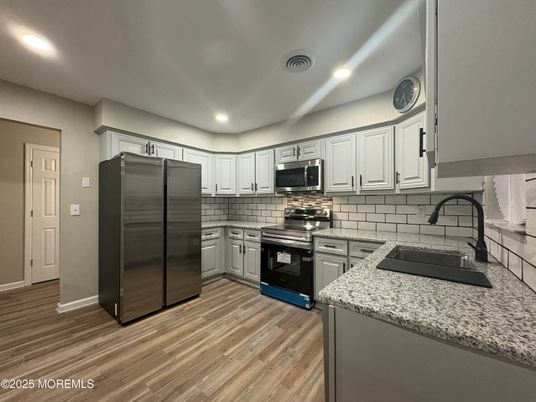 Interior, Kitchen, Recessed Lighting, Stainless Steel Appliances, Wood Texture Flooring