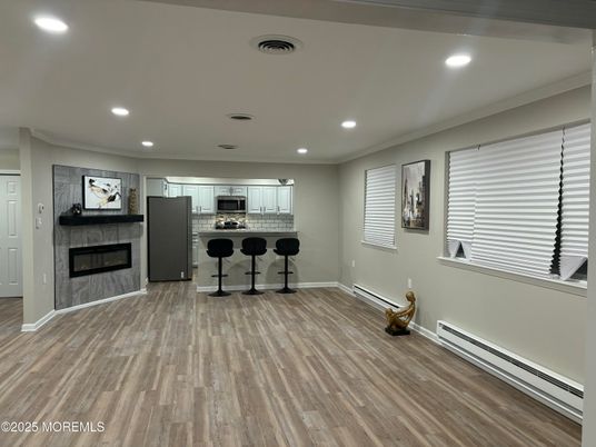 Fireplace, Interior, Kitchen, Recessed Lighting, Wood Texture Flooring