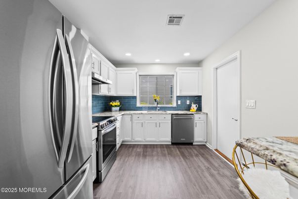 Interior, Kitchen, Recessed Lighting, Stainless Steel Appliances, Wood Texture Flooring