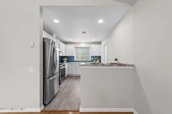Interior, Kitchen, Recessed Lighting, Stainless Steel Appliances, Wood Texture Flooring