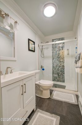 Bathroom, Glass Shower, Interior, Recessed Lighting, Wood Texture Flooring