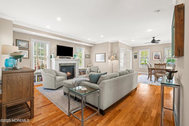 Dining room, Fireplace, Interior, Living room, Recessed Lighting, Wood Texture Flooring
