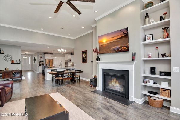 Chandelier, Dining room, Fireplace, Interior, Kitchen, Pendant Lights, Recessed Lighting, Wood Texture Flooring